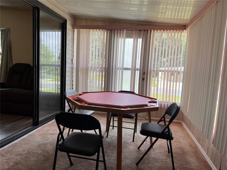 Florida Room with Game Table and Chairs