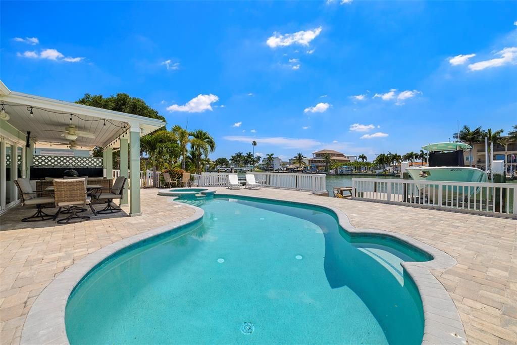 Large heated saltwater pool and spa with plenty of deck space for entertaining