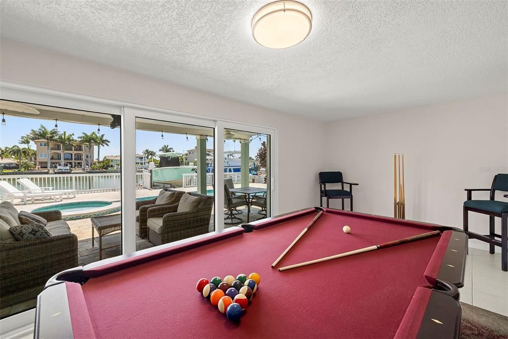 Game room or living room to outside area for ease of entertaining