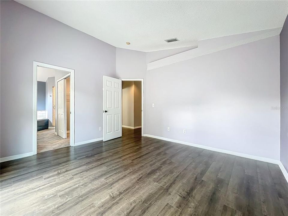 Primary Bedroom with En Suite Bath and Walk In Closet