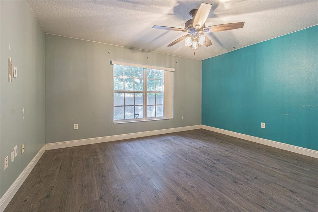 large owner's suite overlooking back yard