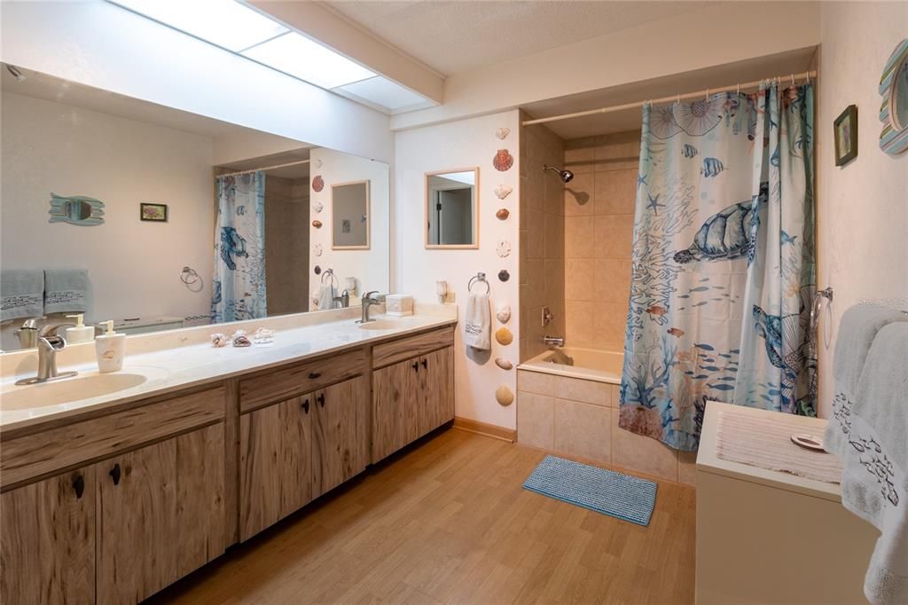 ensuite bathroom dual sinks, skylight, water closet