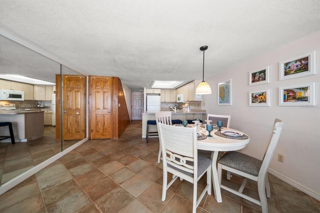 Dining area with open concept floor plan to kitchen.