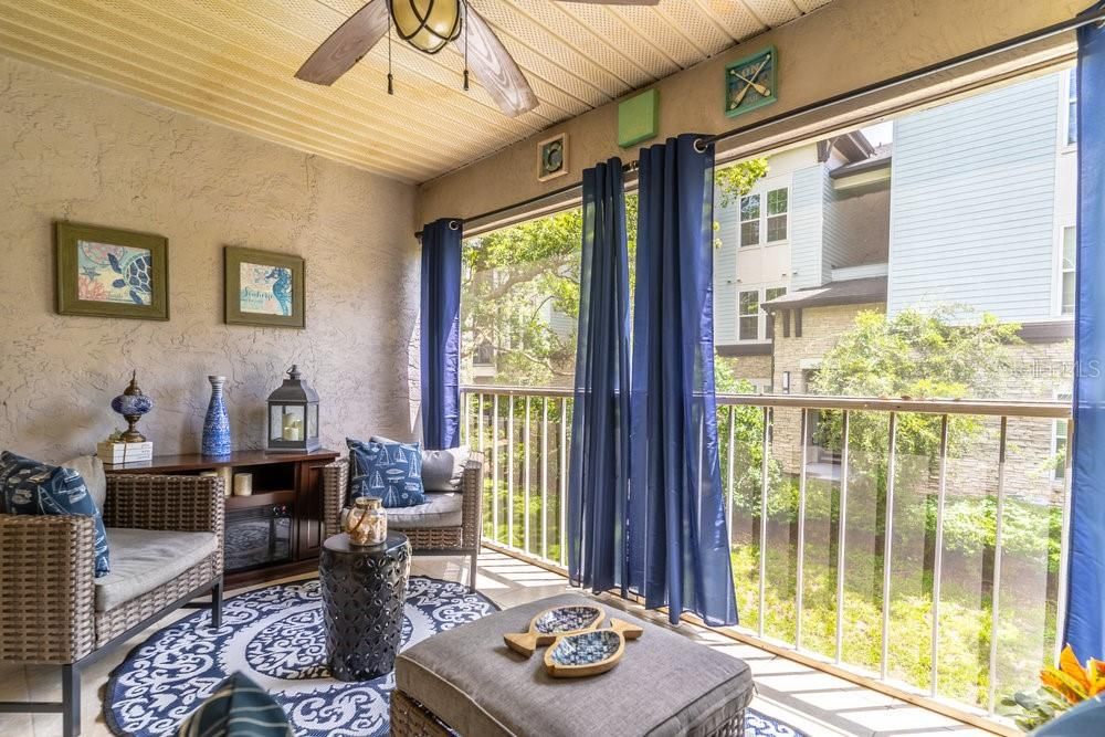 balcony screened-in with green views