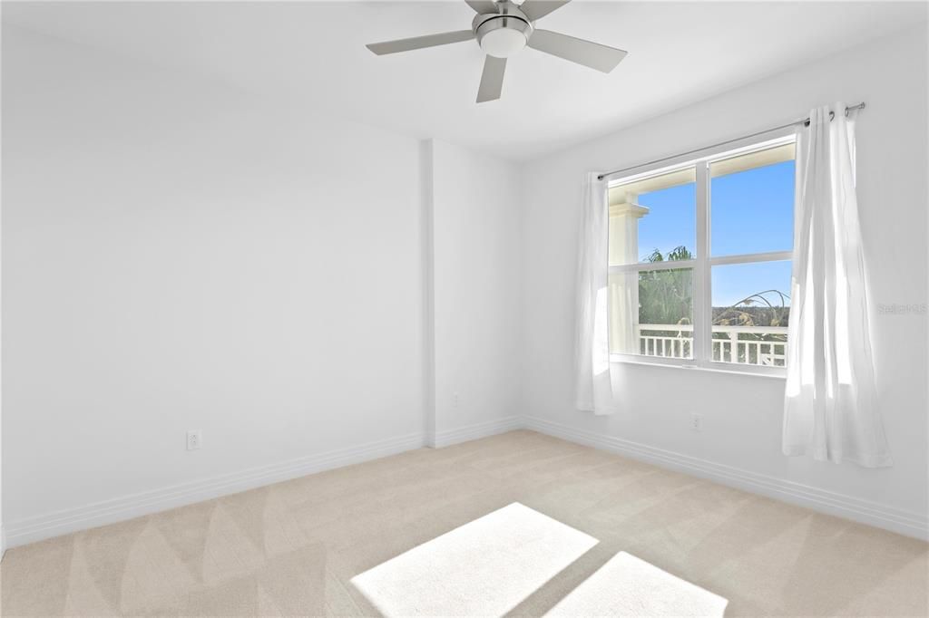 Second Bedroom features a walk in closet with a jack & jill style bathroom