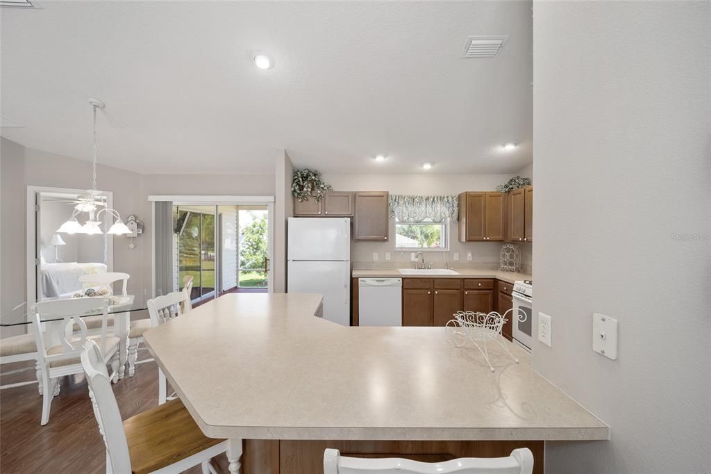 Vaulted Ceilings, Recessed Lights Make this Kitchen Sparkle