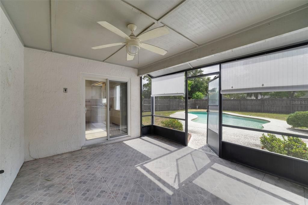 Covered screened patio perfect for entertaining