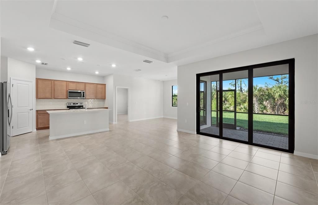 Gathering room - Open to kitchen. Sliding glass door leading to cafe.