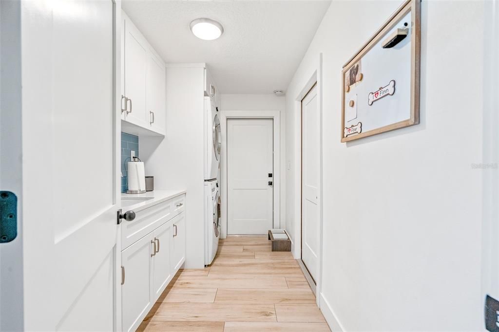 Laundry room with custom built-in storage