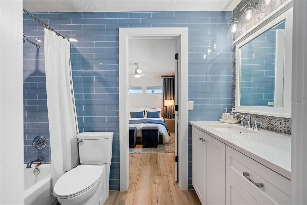 Jack and Jill bathroom with custom designer selected tiles and fixtures