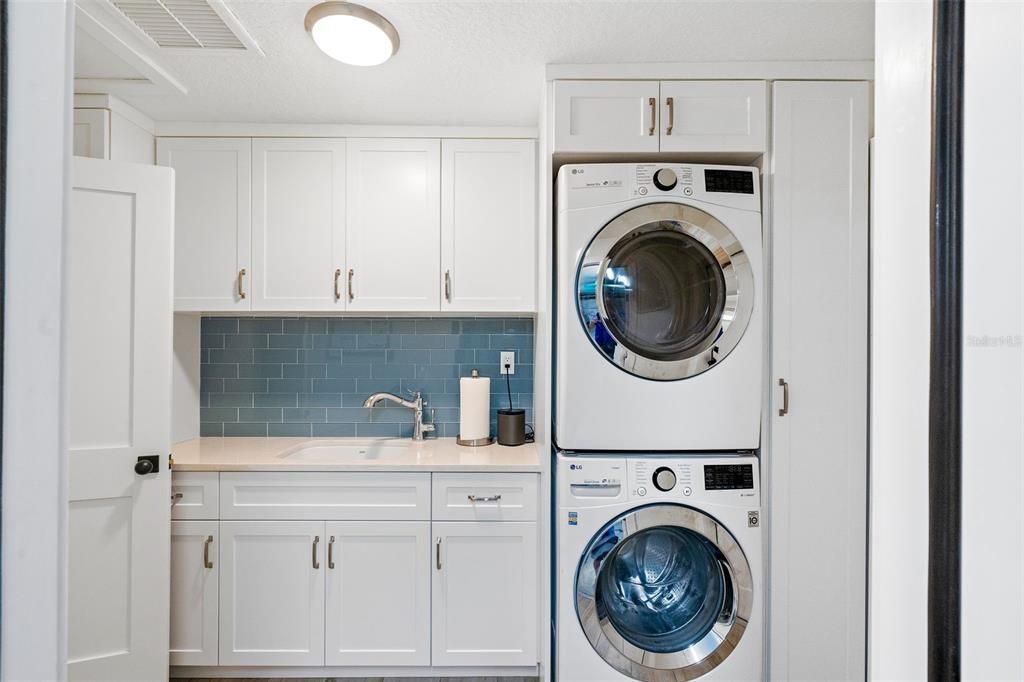 laundry with stackable washer and dryer