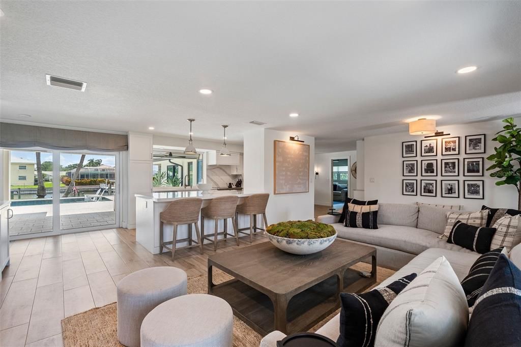 Living room overlooking the water and kitchen