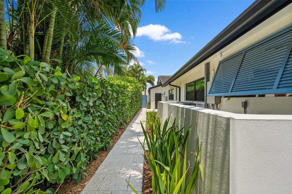 Shellock paver walk way and Aluminum coated Bahmian shutters