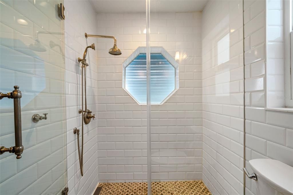 Primary shower with walk in shower and designer tiles