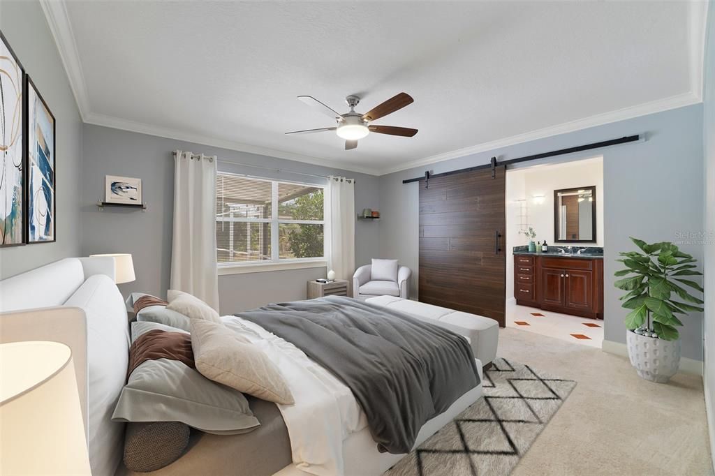 Ideal SPLIT BEDROOMS deliver a light and bright PRIMARY SUITE topped with more of the elegant crown molding and finished with a modern take on a sliding barn into the private en-suite bath and WALK-IN CLOSET complete with a CUSTOM STORAGE SYSTEM. Virtually Staged.