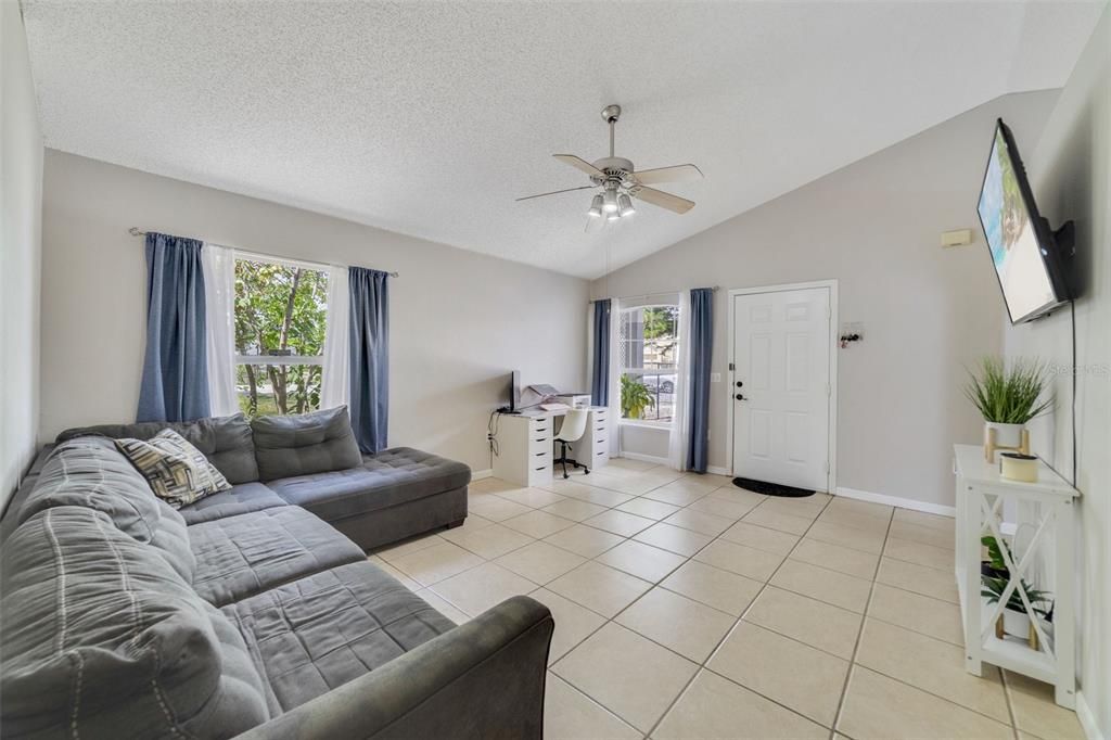 Spacious living space with vaulted ceilings