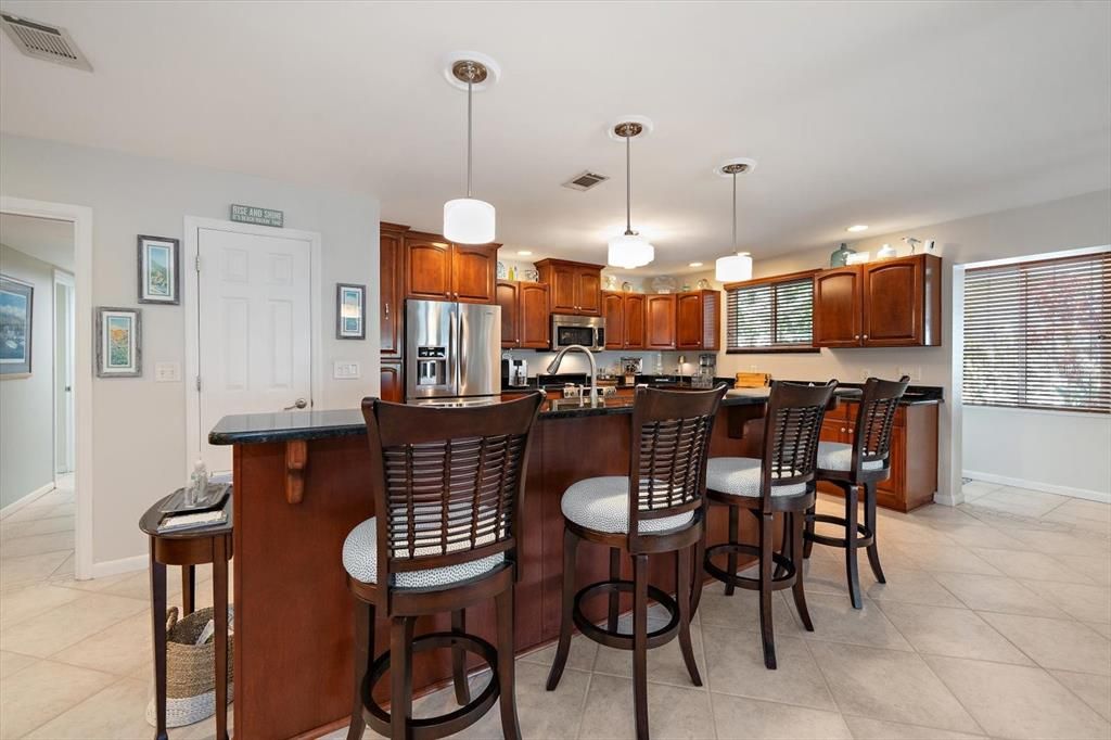 Kitchen with spacious eat-in bar area