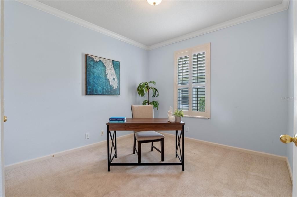 11' x 11' Bedroom #2 w/ crown molding & Plantation style shutters