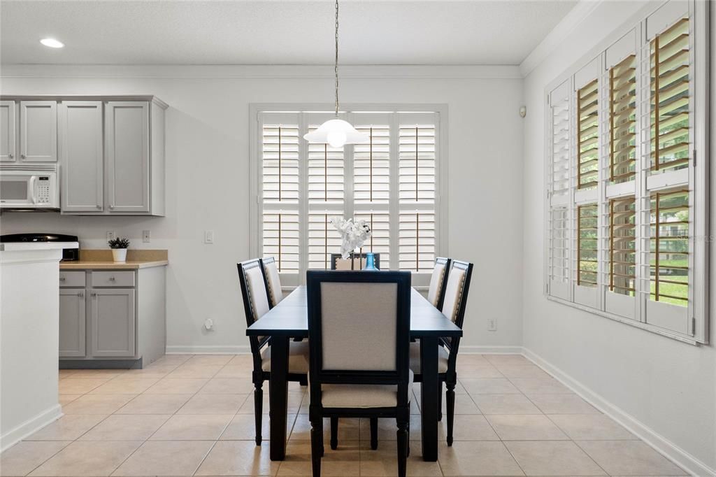 11' x 12' Dining Room w/ several windows for natural light & Plantation style shutters