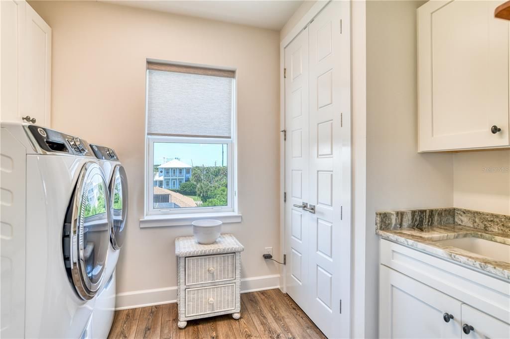 walk in laundry and utility sink with a view!
