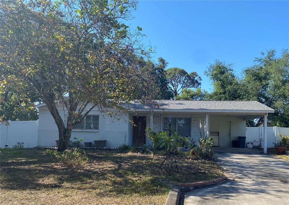 One Car Carport & Large Oversized Driveway