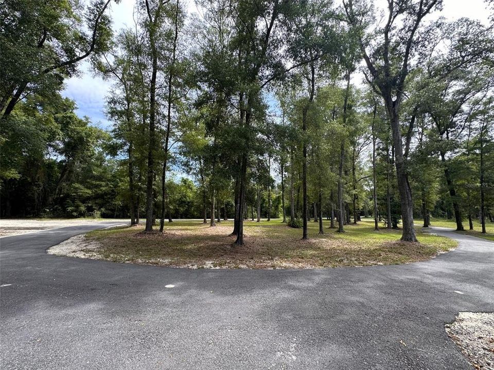 Newer paved circular driveway