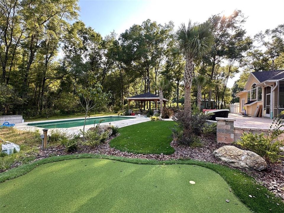 Professionally installed artificial turf & putting area