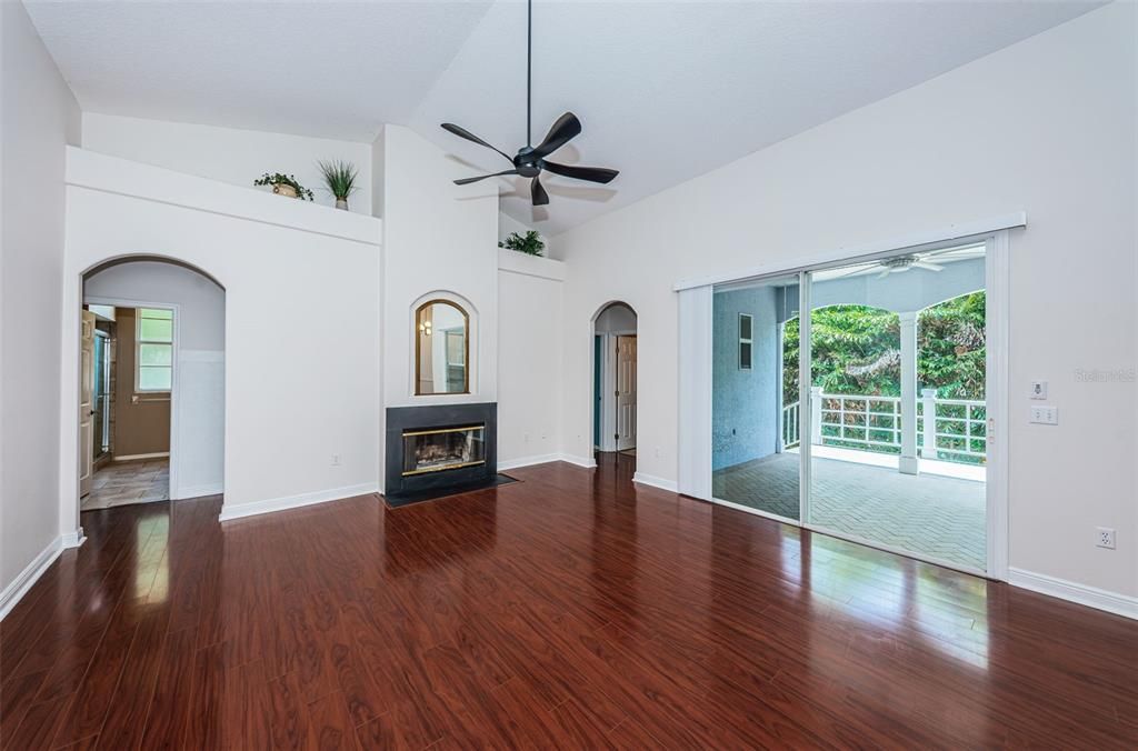 Family room with wood burning fireplace