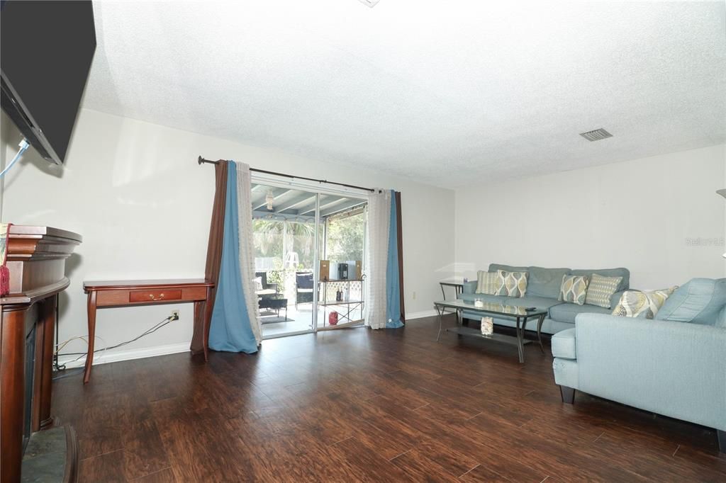 Living room looking onto back patio