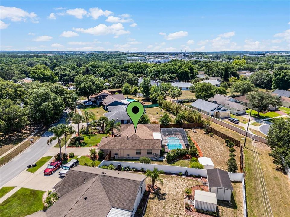 aerial view to show the large fenced in yard