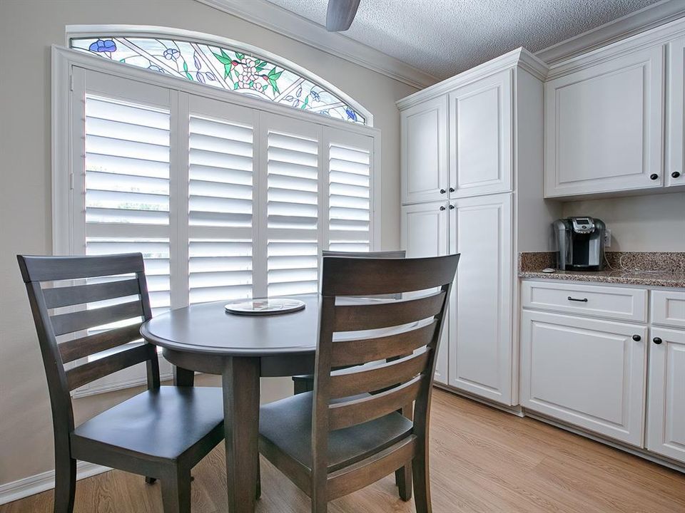 CASUAL DINING NOOK IN THE KITCHEN... JUST PERFECT FOR MORNING COFFEE!