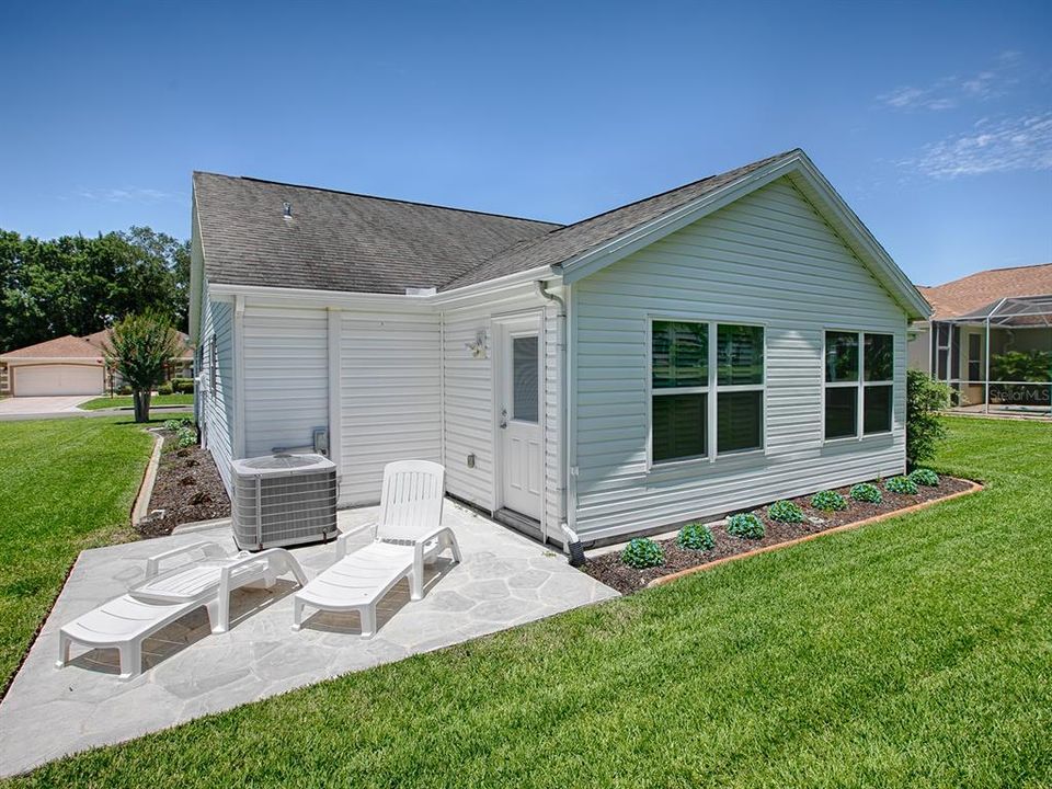 STEP OUTSIDE ONTO THE PATIO... PERFECT FOR LOUNGING OR OUTDOOR GRILLING!