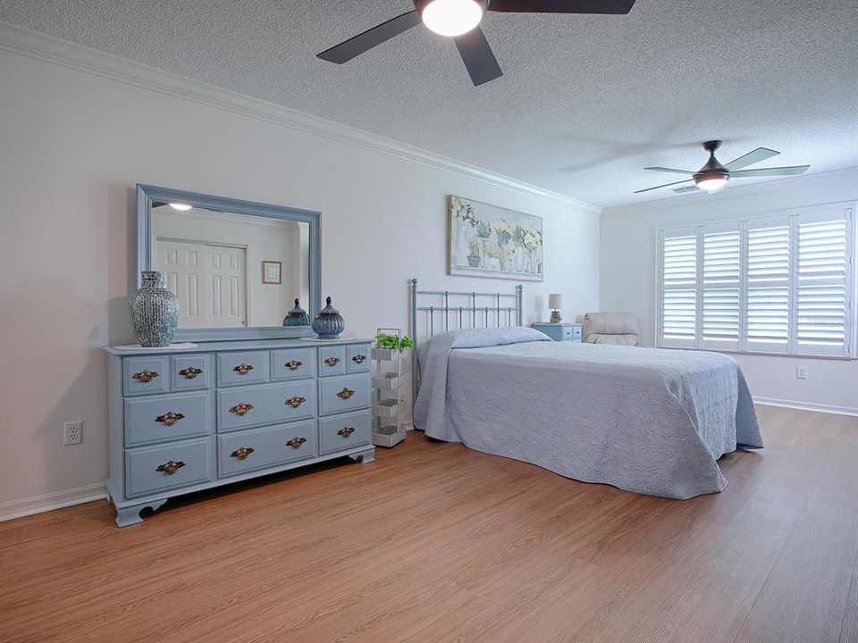 THE MASTER BEDROOM... LIGHT COLOR PALETTE CONVEYS A SERENE AND PEACEFUL ATMOSPHERE...