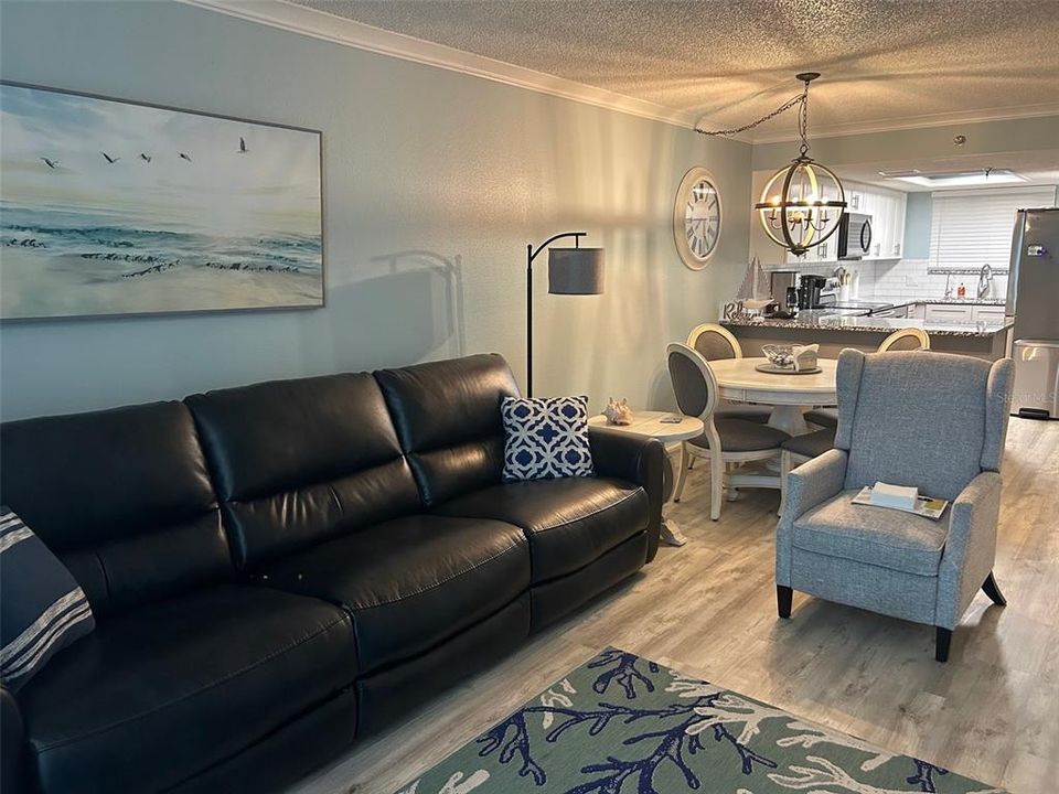 Living Room, dining and kitchen areas all include new, high-end furnishings.  The value of this property is visible throughout in addition to being right on the Gulf of Mexico!