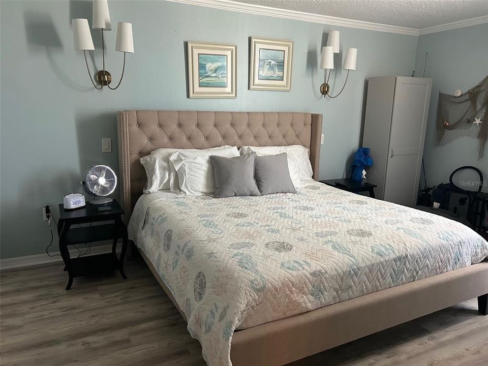 The Master bedroom has a king-size bed and sliders with a full view of the Gulf outside the door.  Awake to Pelicans soaring and Osprey fishing.