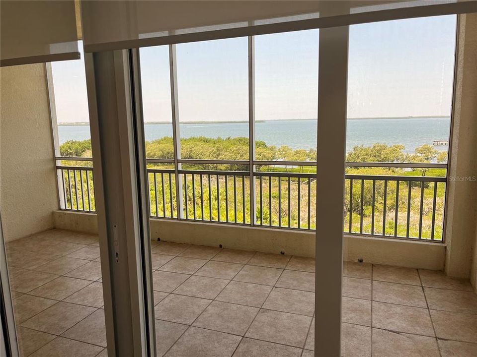 Screened in patio set up perfect to take in the sunsets