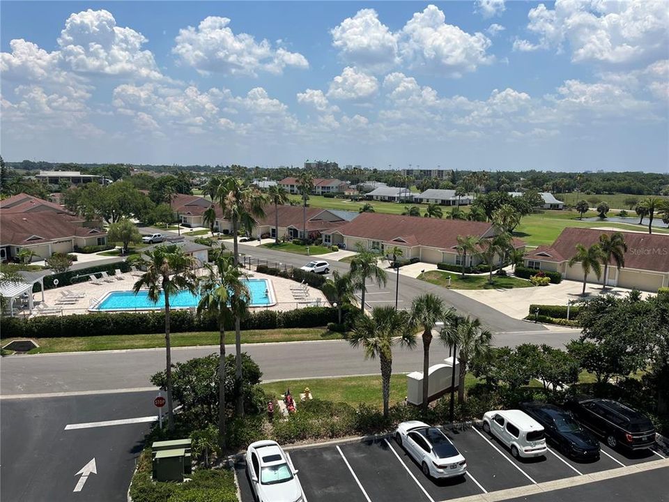 Br #2 has a small patio with view of neighboring swimming pool and beautiful landscape