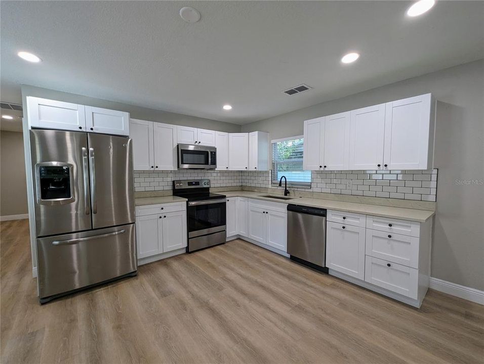 Functional Kitchen with Space for Table/Bar