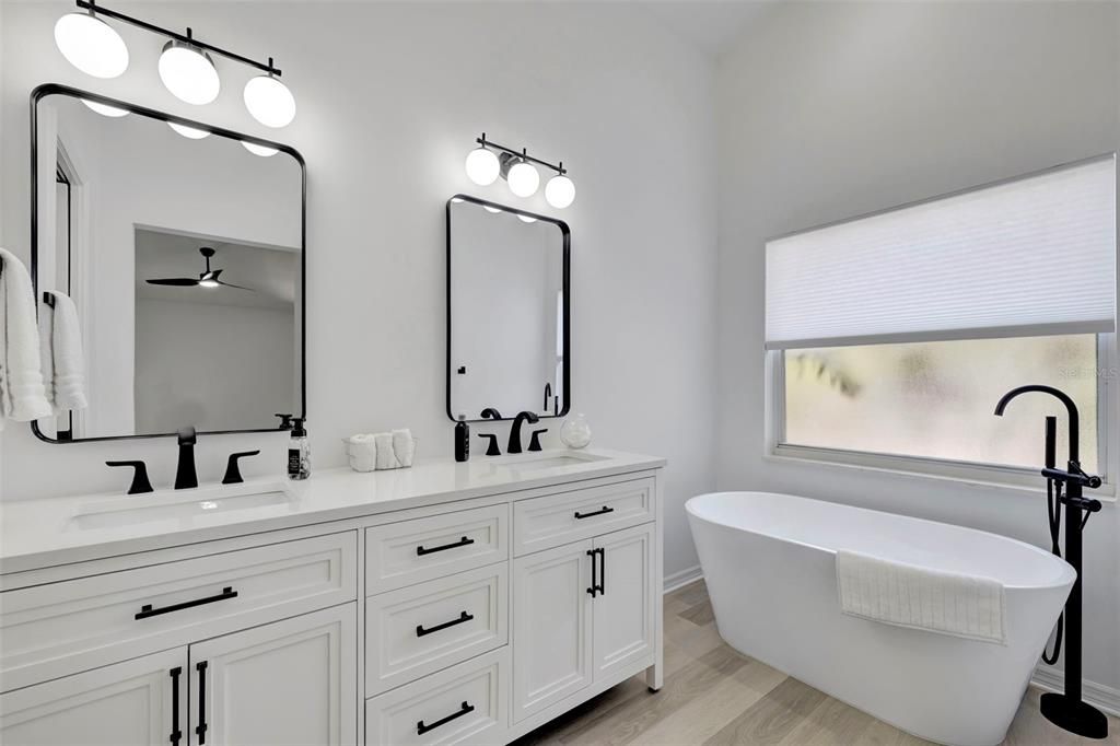 Primary bathroom with alcove tub