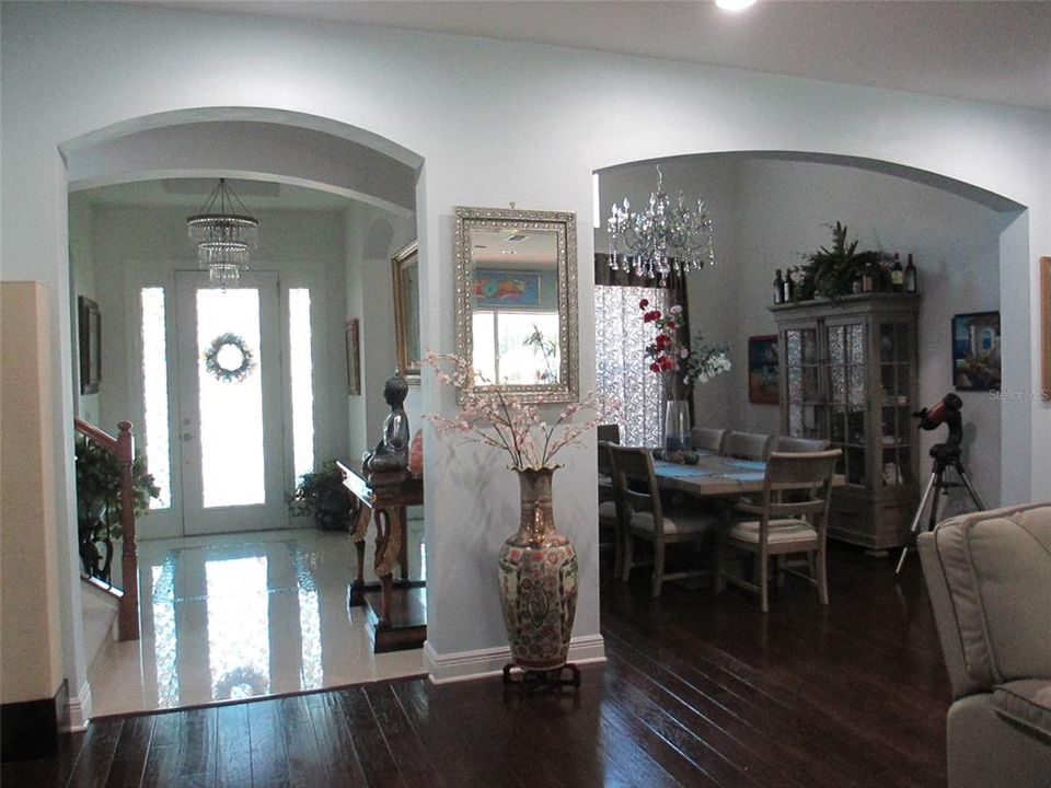 CAFE AREA AT END OF KITCHEN WITH VIEW OF POOL AND PATIO