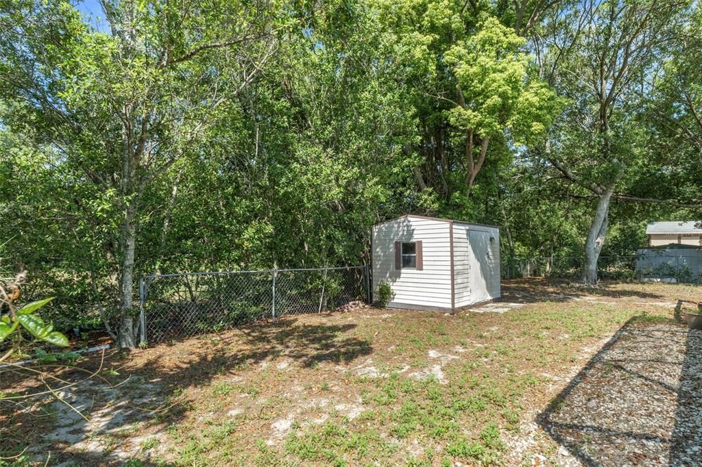 There is a large shed in the backyard