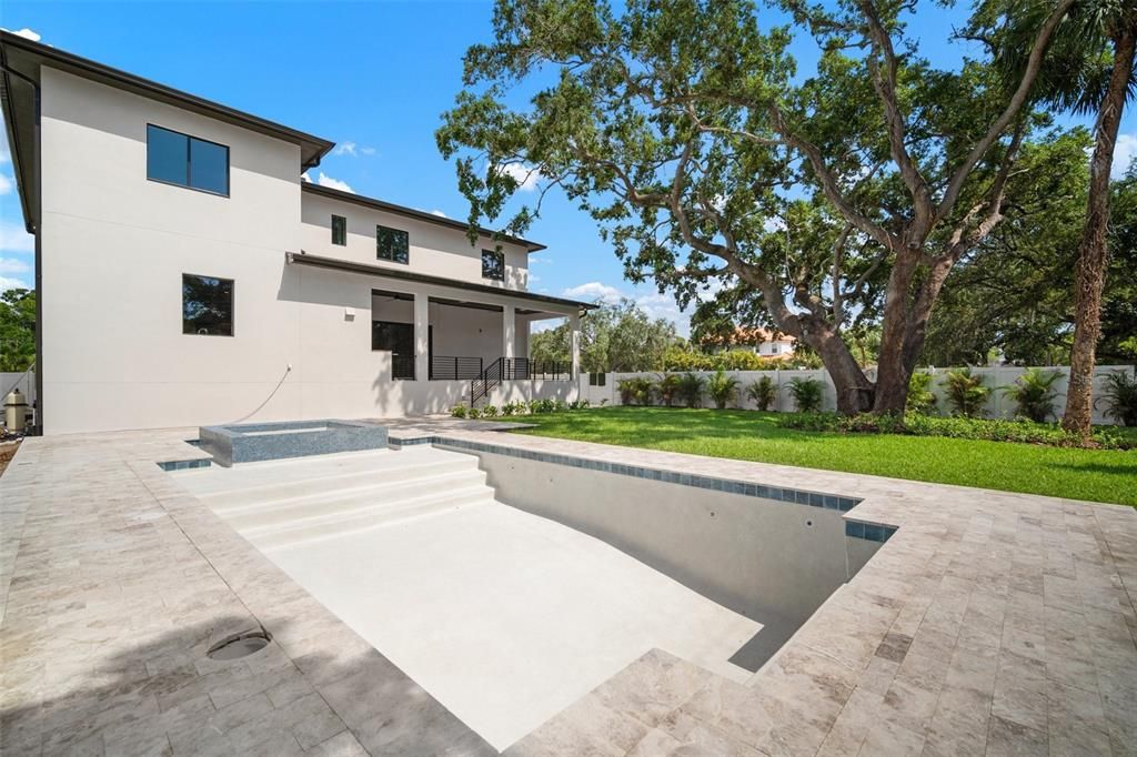 large pool with sunshelf