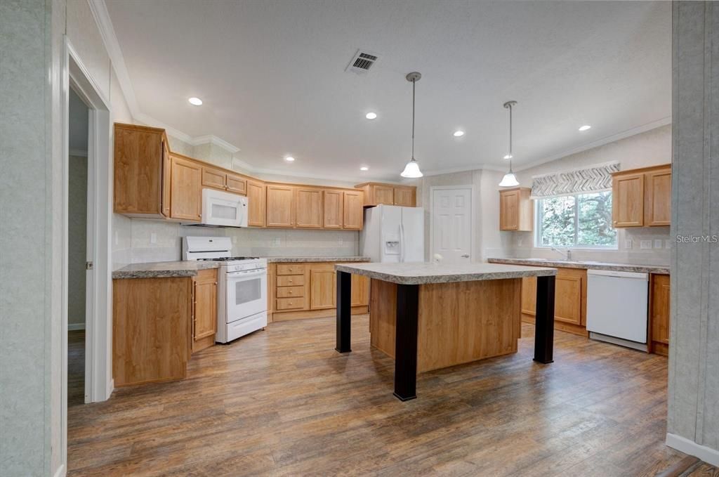 This amazing kitchen is huge with plenty of storage!