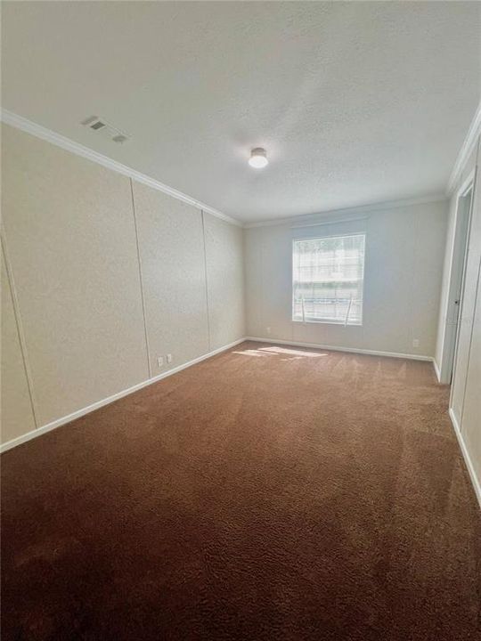 Bedroom #2 is light and bright with a walk in closet!