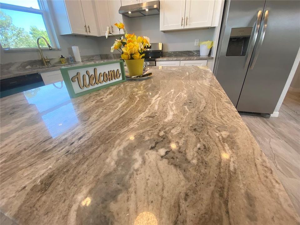 kitchen island, granite tops