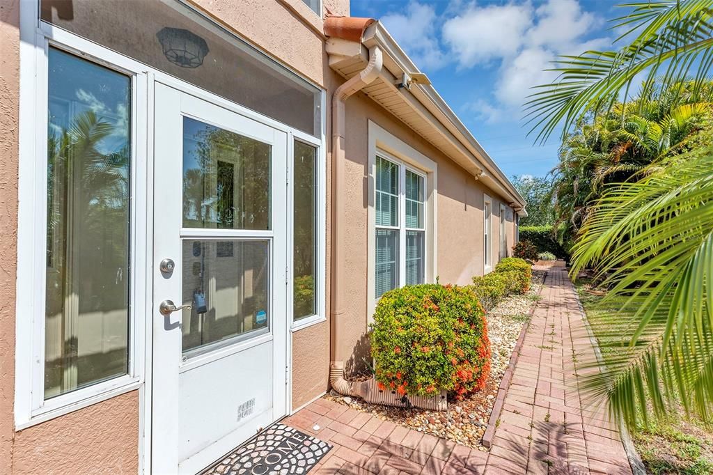 Brick sidewalk to the rear with access to lanai