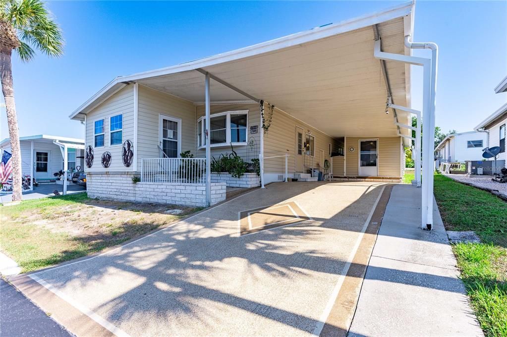 Extended width carport on this home.