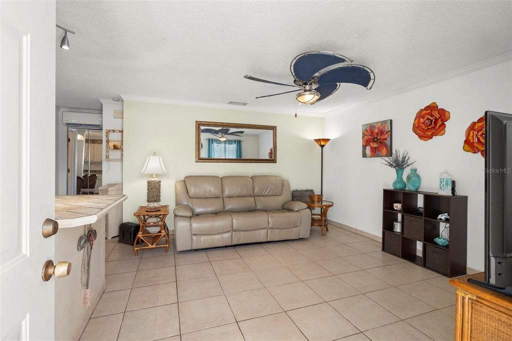 Renovated condo with an open, efficient floor plan. Features a stylish ceiling fan and large ceramic tile.  Absolutely no carpet in this home!