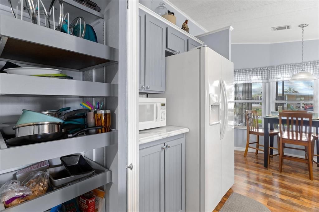 VIEW OF PANTRY, LARGER REFRIGERATOR SPACE AND EAT-IN AREA