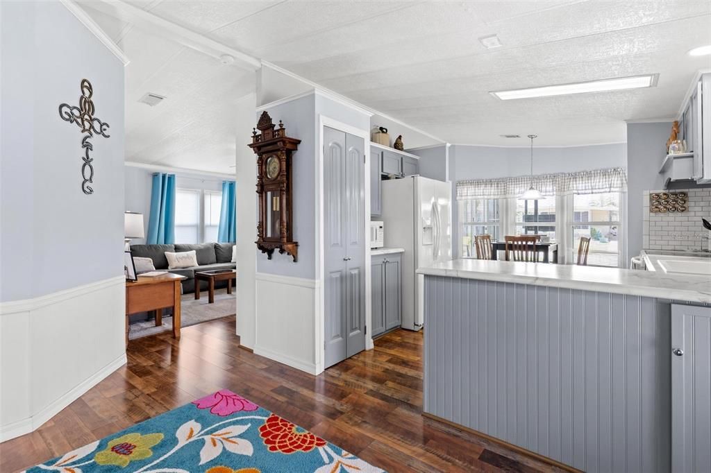 VIEW OF KITCHEN AND LIVING ROOM